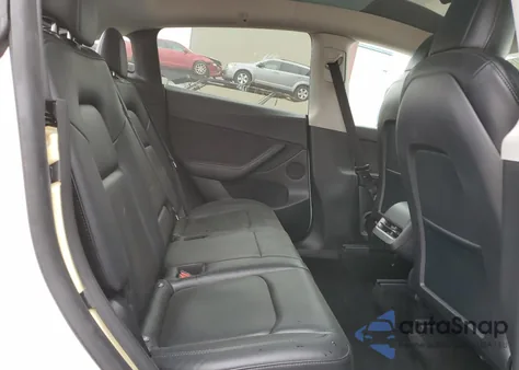 2022 Tesla Model Y из США, поврежденный, VIN 7SAYGDEE1NF386885